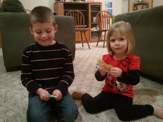 The kids collected all the money scattered in the living room.