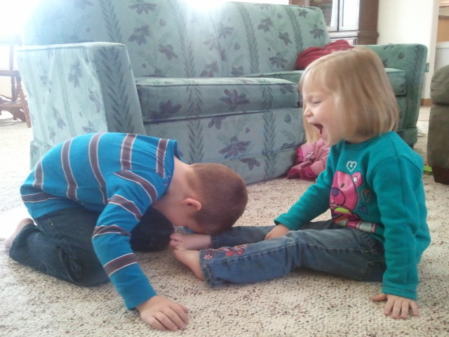 As we acted out Jesus being anointed, we discovered that it tickles to have our feet wiped with someone else's hair! :)