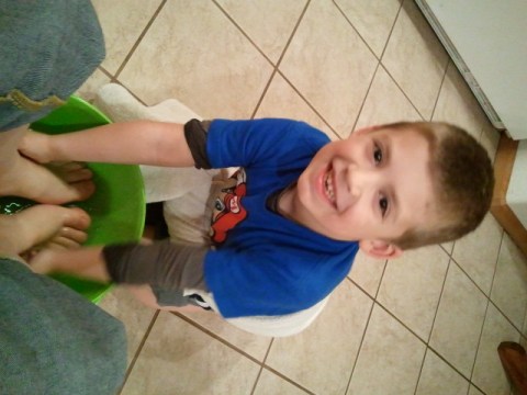 Jackson washes my feet.