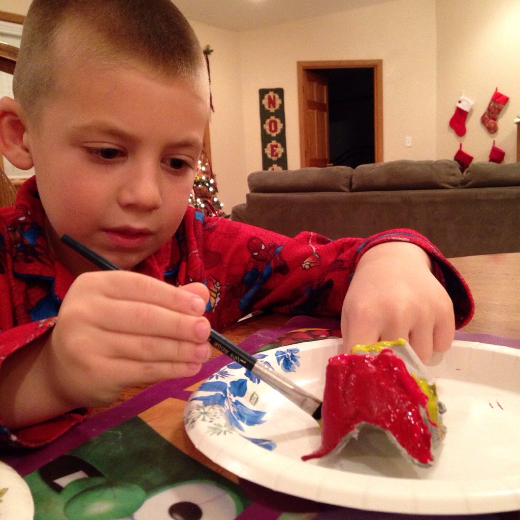 Jackson paints his Bethlehem ornament.