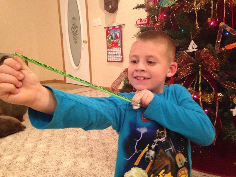 Jackson steadies his slingshot before letting it loose.
