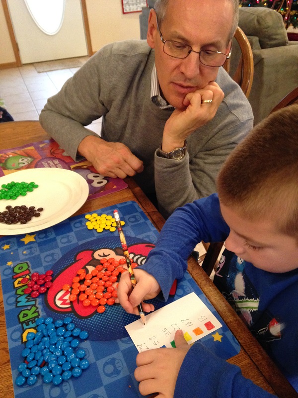 Papa and Jackson tally the final count for our M&M census.
