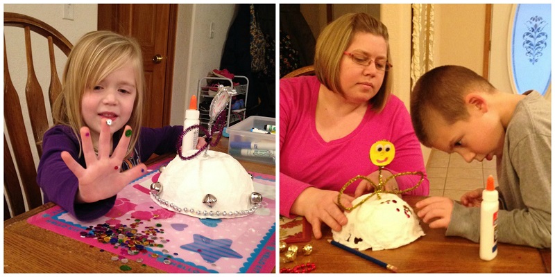 The kids add some bling to their angel skirts.