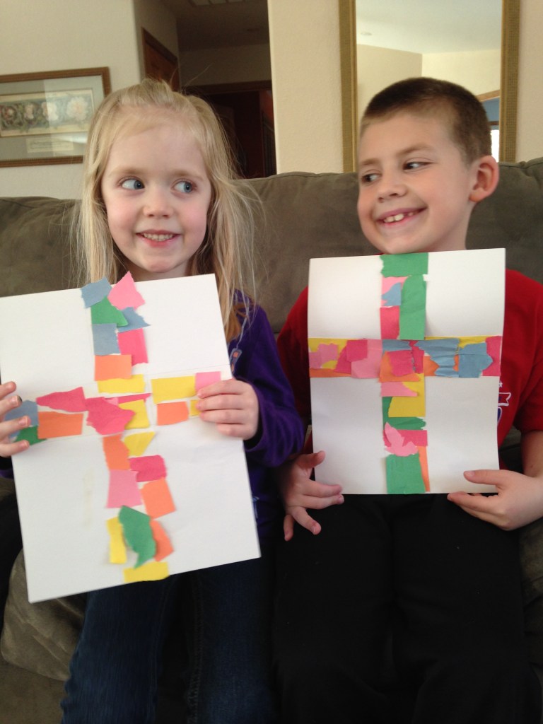 Jackson and Lauren made crosses out of ripped paper pieces