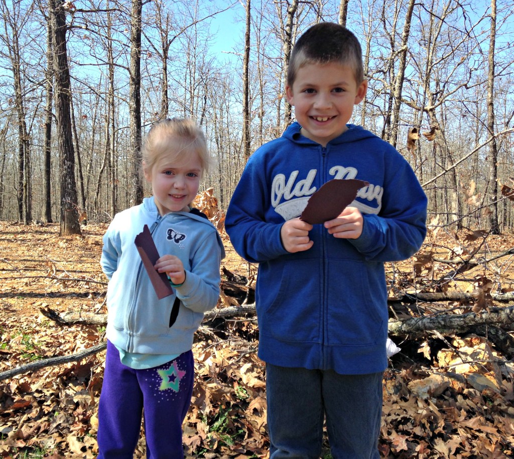 Lauren and Jackson hold black paper representing their sin.