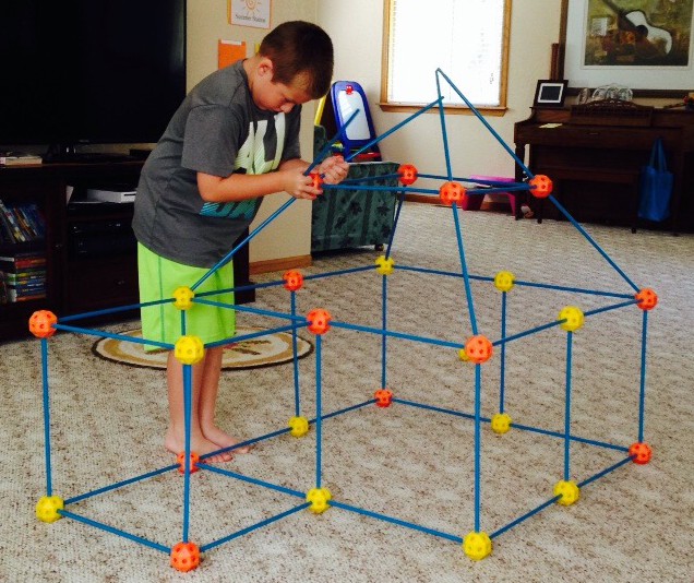 Jackson works to build his fort