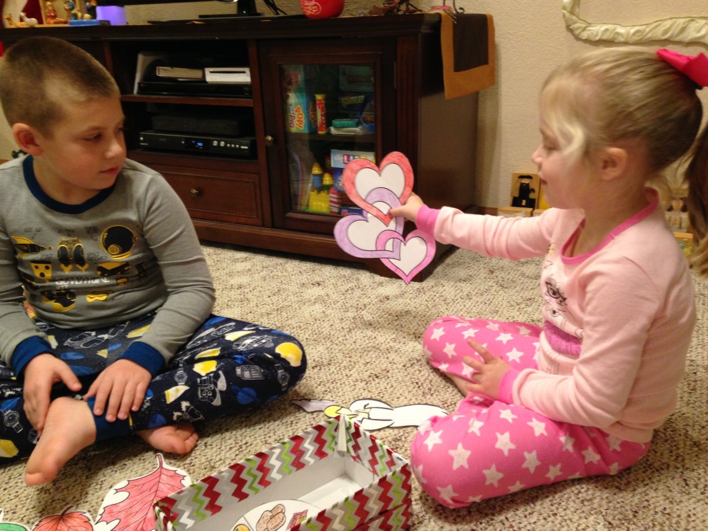 Jackson and Lauren open our present filled with God's promises.